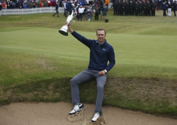 Jordan Spieth poses with the Claret Jug